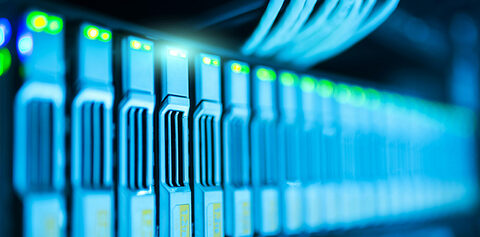 The image shows rows and rows of hard drives